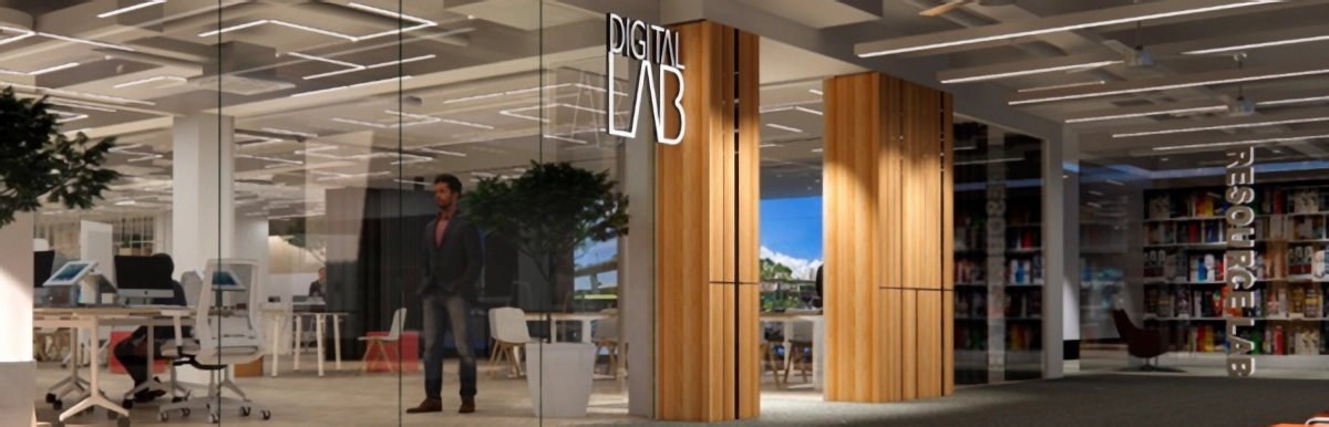 Modern office space with a glass-walled Digital Lab entrance, a wooden pillar, and bookshelves on the right.